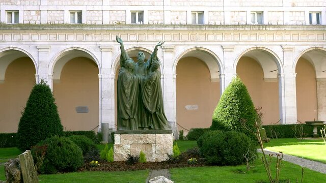 Statue of San Benedetto. The entrance cloister of Monte Cassino Abbey and the death of Saint Benedict Statue