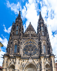 Facade exterior of St. Vitus Cathedral or The Metropolitan Roman Catholic Cathedral of Saints Vitus, Wenceslaus and Adalbert in Prague Castle Hradcany Lesser Town district, Bohemia, Czech Republic