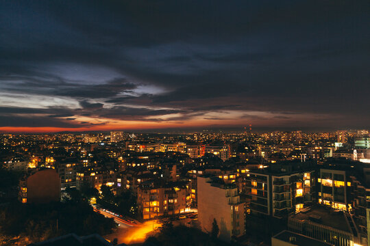 View over city illuminated at night
