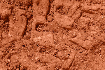 close up of tire print on the ground