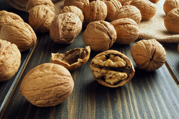 Walnuts on a dark wooden table