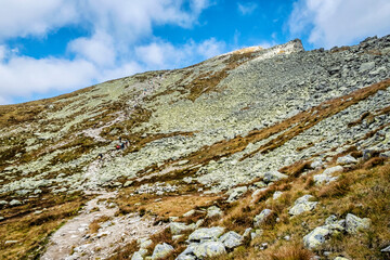 Many tourists on the Koprovsky peak, High Tatras mountains, Slovakia, hiking theme