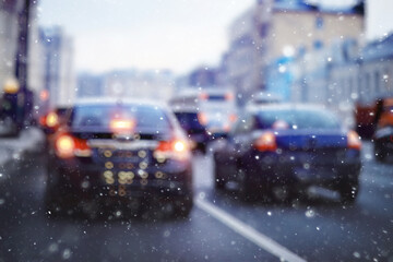 blurred transport background snow / traffic on a winter highway, seasonal auto concept, blurry auto...