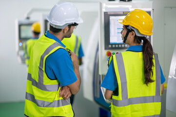 multi ethnicity engineer and workers working in line up