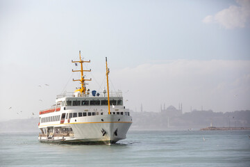 Front view passenger ferry on a cloudy day
