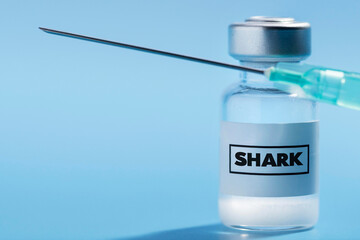 vial and syringe withText saying 