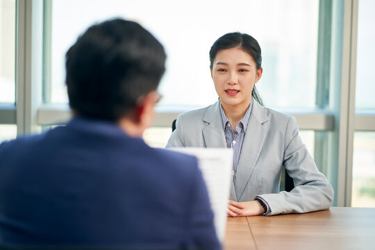 young asian business woman candidate being interviewed by hr manager