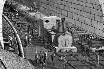 Construction of Gotthard tunnel, Switzerland. Compressed air locomotive used for debris removal. Antique illustration. 1882.