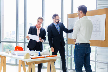 Group engineering or business people working and meeting with manager, Project planner or architecture discussion with team