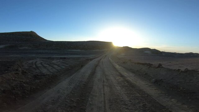 Running in the sunset yardang landform aera in China