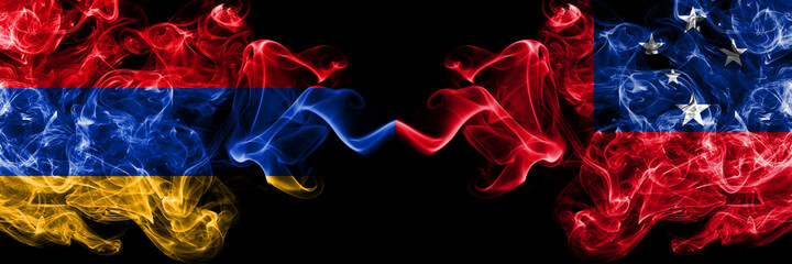 Armenia vs Samoa, Samoan smoky mystic flags placed side by side. Thick colored silky abstract smoke flags
