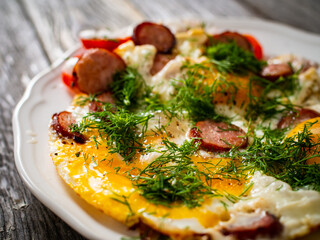 Breakfast - scrambled eggs with sausage and vegetables