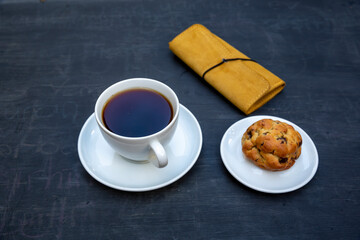 Top view of tea cup on black table