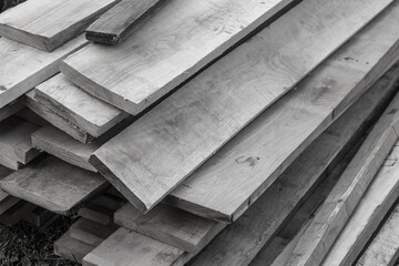 gray boards a lot of building materials a pattern wooden design stained