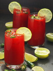 Jalapeno tomato margarita cocktail with lime	