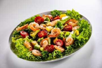 Prawn salad on gray background