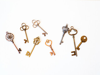 Many different old keys from different locks, scattered chaotically,