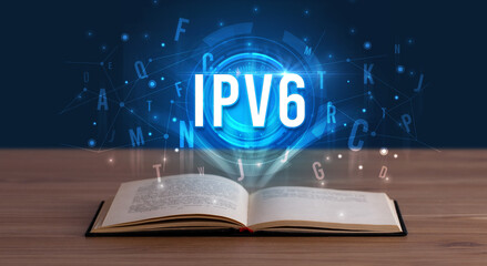 IPV6 inscription coming out from an open book, digital technology concept