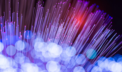 Fiber optics network cable on technology background