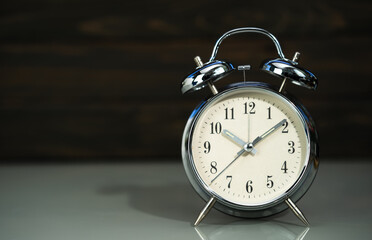 Retro alarm clock on table