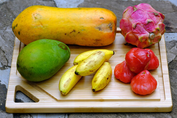Indonesia Batam - Indonesian tropical fruits Papaya - Plum - Mango - Salak (Snake fruit) - Banana - Pitaya (Dragon fruit)
