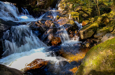 Fototapeta na wymiar Whillan Beck waterfalls in Boot, Holmbrook, Cumbria