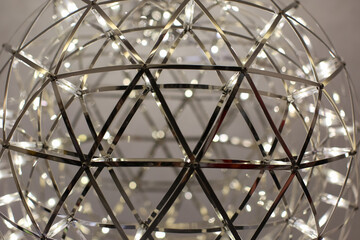 LED modern metal chandelier on the ceiling.