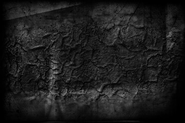 Fototapeta premium Cement old wall plaster in black and gray with a damaged surface covered with scratches, cracks and grains.