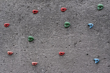 Rock climbing concert wall with many colorful holds