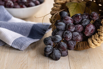 Purple Grapes in a Basket