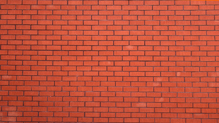 Fototapeta na wymiar Old brick wall, old texture of red stone blocks closeup