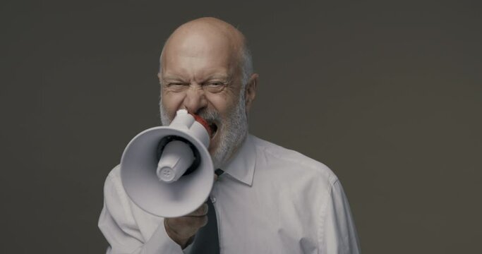Aggressive boss shouting on a megaphone