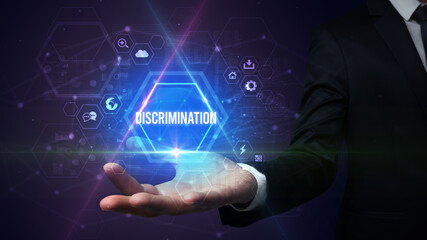 Man hand holding DISCRIMINATION inscription, social media concept