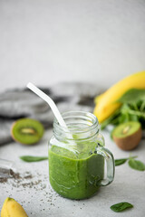 green spinach, kiwi and banana smoothie with chia seeds