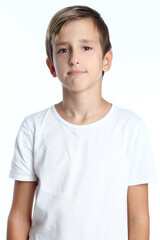 Photo of adorable young happy boy looking at camera.