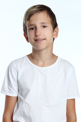 White T-shirt on a cute boy, isolated on white background