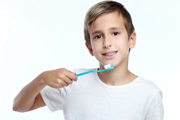 Young boy brushing his teeth