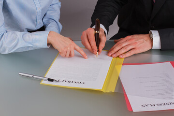 Businessman sign contract after negotiation in office. Business partners or colleagues making agreement or notarize deal.