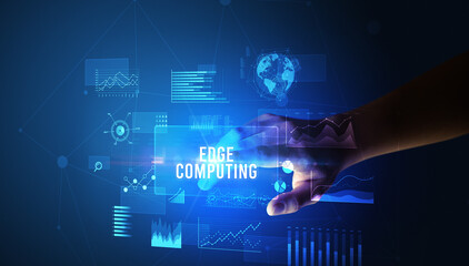 Hand touching EDGE COMPUTING inscription, new business technology concept