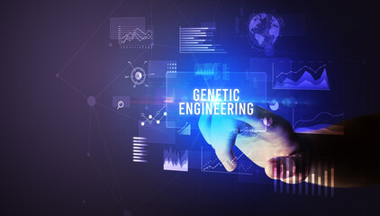 Hand touching GENETIC ENGINEERING inscription, new business technology concept