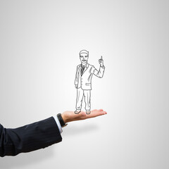 Caricatures of businessman in palm