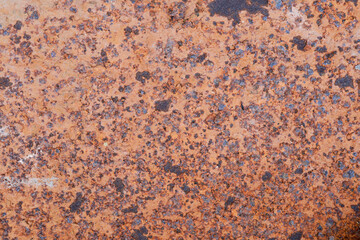 Rusted metal background with rust wrinkles, rust stains, metal surfaces as rust spots, corrosion