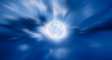 Night sky with moon in the blured clouds"Elements of this image furnished by NASA