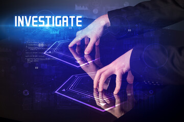 Hand touching digital table with INVESTIGATE inscription, new age security concept