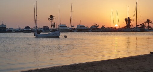 boats at sunset © david