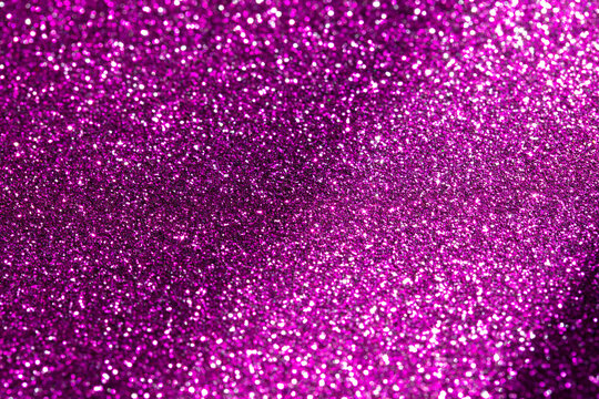 blured purple glitter texture abstract background