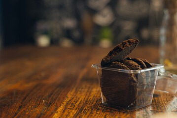 Delicious chocolate cookie on wood table
