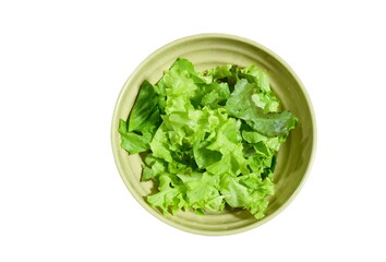 slice fresh green oak and lettuce salad in bowl on white background