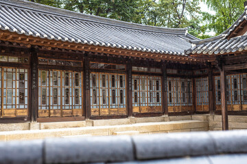 traditional korean building in the rain