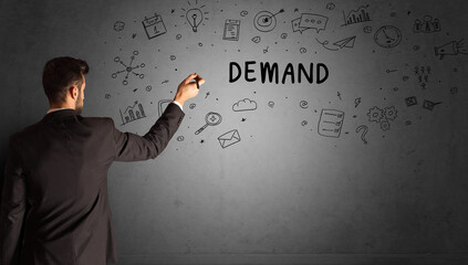 businessman drawing a creative idea sketch with DEMAND inscription, business strategy concept